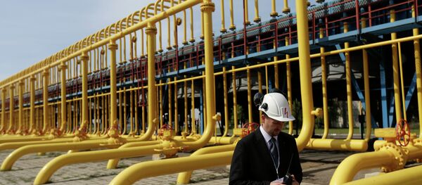 An employee walks past gas pipes at the gas compressor station in Velke Kapusany, Slovakia An employee walks past gas pipes at the gas compressor station in Velke Kapusany, Slovakia - Sputnik International