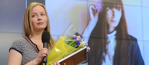 Winner of the Andrei Stenin International Press Photo Contest's Grand Prix Yelena Anosova at the award ceremony held at the Rossiya Segodnya International News Agency’s International Multimedia Press Center Winner of the Andrei Stenin International Press Photo Contest's Grand Prix Yelena Anosova at the award ceremony held at the Rossiya Segodnya International News Agency’s International Multimedia Press Center - Sputnik International