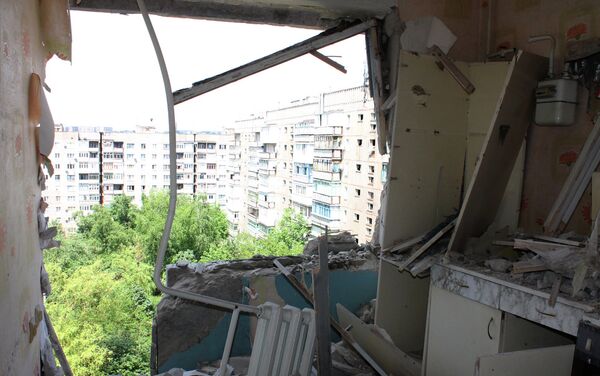 A destroyed apartment in a multiple occupancy building that was damaged during the shelling of Gorlovka in the Donetsk Region - Sputnik International