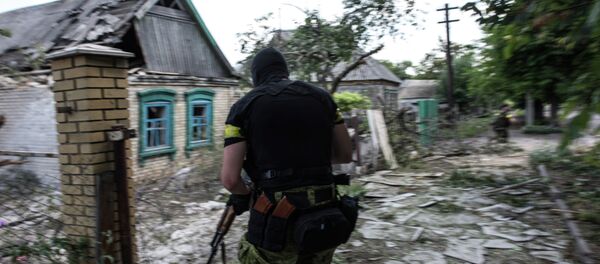 A Ukrainian serviceman A Ukrainian serviceman - Sputnik International