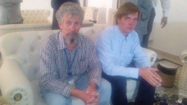 Sergei Cherepanov (L) and Mikhail Antyufeev, the two Russians kidnapped in Sudan's Darfur region in January 2015 - Sputnik International