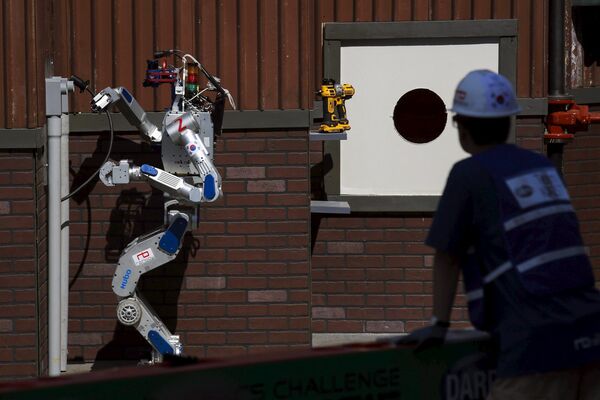 The Team KAIST DRC-Hubo robot completes the plug task before winning the finals of the Defense Advanced Research Projects Agency (DARPA) Robotic Challenge in Pomona, California June 6, 2015 The Team KAIST DRC-Hubo robot completes the plug task before winning the finals of the Defense Advanced Research Projects Agency (DARPA) Robotic Challenge in Pomona, California June 6, 2015 - Sputnik International
