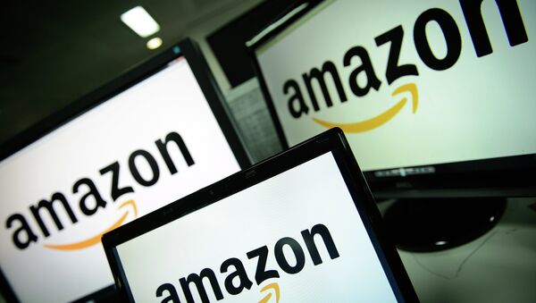 A picture shows the logo of the online retailer Amazon dispalyed on computer screens in London on December 11, 2014 - Sputnik International