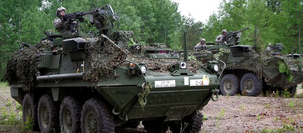 Soldiers from the US Pennsylvania National Guard take part in a field training exercise during the first phase Saber Strike 2014, at the Rukla military base, Lithuania, on June 14, 2014 Soldiers from the US Pennsylvania National Guard take part in a field training exercise during the first phase Saber Strike 2014, at the Rukla military base, Lithuania, on June 14, 2014 - Sputnik International