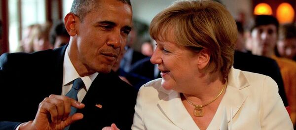 German Chancellor Angela Merkel, right, speaks with US President Barack Obama during the G-7 summit German Chancellor Angela Merkel, right, speaks with US President Barack Obama during the G-7 summit - Sputnik International
