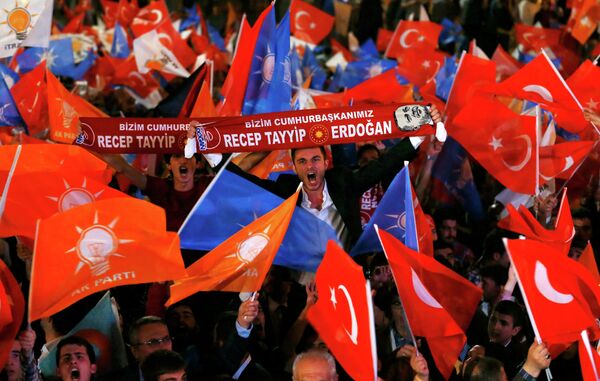Supporters wave Turkish national and party flags outside the AK Party headquarters in Ankara, Turkey, June 7, 2015 - Sputnik International