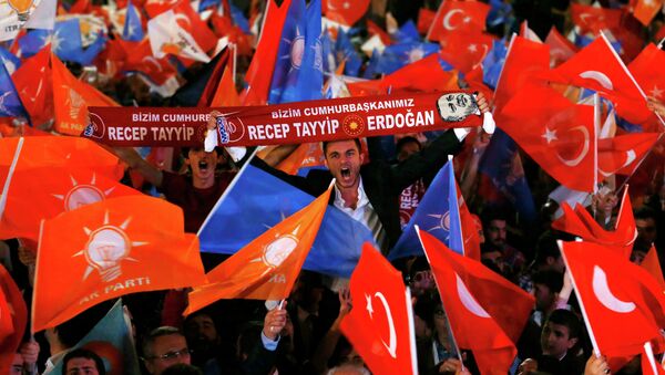 Supporters wave Turkish national and party flags outside the AK Party headquarters in Ankara, Turkey, June 7, 2015 - Sputnik International