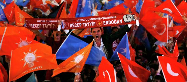 Supporters wave Turkish national and party flags outside the AK Party headquarters in Ankara, Turkey, June 7, 2015 - Sputnik International
