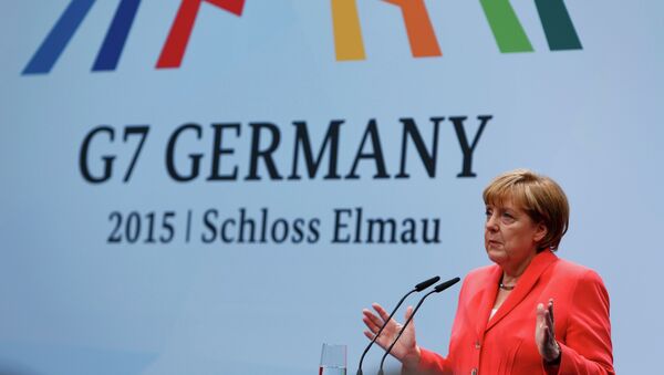 German Chancellor Angela Merkel holds a news conference during the G7 summit at Elmau Castle hotel in Kruen near Garmisch-Partenkirchen, southern Germany, June 8, 2015 - Sputnik International