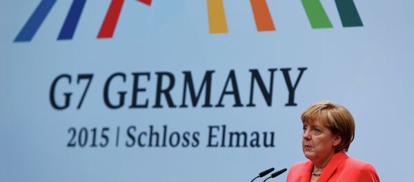 German Chancellor Angela Merkel holds a news conference during the G7 summit at Elmau Castle hotel in Kruen near Garmisch-Partenkirchen, southern Germany, June 8, 2015 German Chancellor Angela Merkel holds a news conference during the G7 summit at Elmau Castle hotel in Kruen near Garmisch-Partenkirchen, southern Germany, June 8, 2015 - Sputnik International
