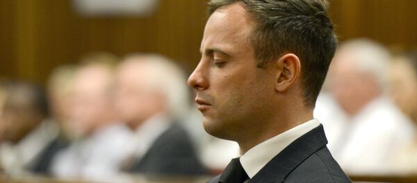 Paralympian Oscar Pistorius is seen during his sentencing for the killing of his girlfriend Reeva Steenkamp at the high court in Pretoria, on October 21, 2014 Paralympian Oscar Pistorius is seen during his sentencing for the killing of his girlfriend Reeva Steenkamp at the high court in Pretoria, on October 21, 2014 - Sputnik International