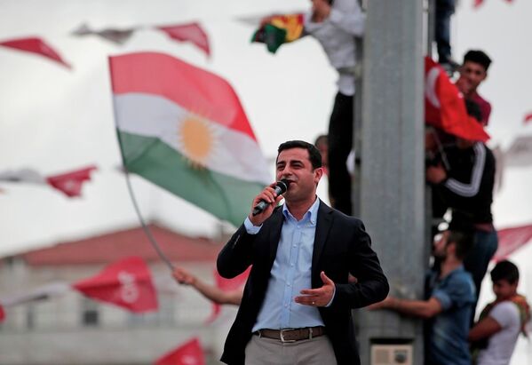 Selahattin Demirtas, co-chair of the pro-Kurdish Peoples' Democratic Party (HDP), delivers a speech from the top of his election campaign bus at a rally in Istanbul, Turkey, Saturday, June 6, 2015. - Sputnik International