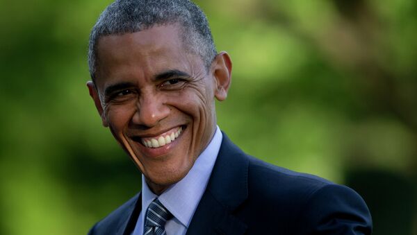 President Barack Obama smiles as he walks across the South Lawn to the White House from Marine One, Wednesday, May 20, 2015, in Washington - Sputnik International