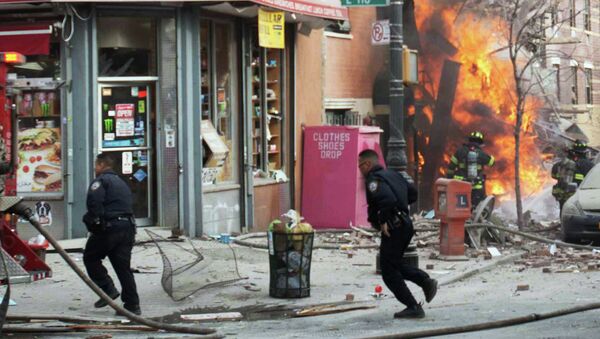 FILE - In this March 12, 2014 file photo, emergency crews respond to an explosion that leveled two apartment buildings and killed eight people in the East Harlem neighborhood of New York - Sputnik International