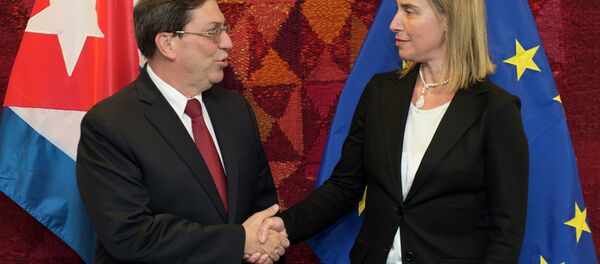 High Representative of the Union for Foreign Affairs and Security Policy and Vice-President of the Commission Federica Mogherini (R) welcomes Cuban Foreign Minister Bruno Rodríguez Parilla on April 22, 2015 before their bilateral meeting at EU headquarters in Brussels High Representative of the Union for Foreign Affairs and Security Policy and Vice-President of the Commission Federica Mogherini (R) welcomes Cuban Foreign Minister Bruno Rodríguez Parilla on April 22, 2015 before their bilateral meeting at EU headquarters in Brussels - Sputnik International