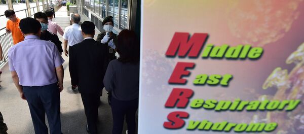 South Korean soldiers check the body heat of visitors at the entrance of the Defence Ministry in Seoul on June 9, 2015 South Korean soldiers check the body heat of visitors at the entrance of the Defence Ministry in Seoul on June 9, 2015 - Sputnik International