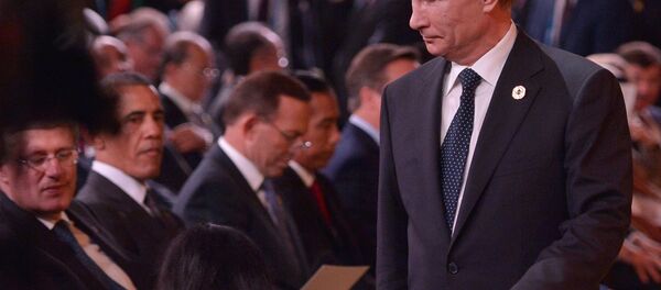 Russia's President Vladimir Putin (R) arrives as (L-R) Canada's Prime Minister Stephen Harper and US President Barack Obama look on during the 2014 G20 Summit.file photo Russia's President Vladimir Putin (R) arrives as (L-R) Canada's Prime Minister Stephen Harper and US President Barack Obama look on during the 2014 G20 Summit.file photo - Sputnik International