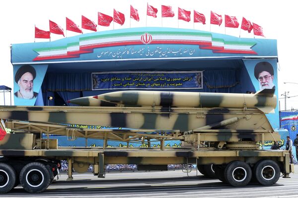 Missiles are displayed by the Iranian army in a military parade marking National Army Day in front of the mausoleum of the late revolutionary founder Ayatollah Khomeini, just outside Tehran, Iran, Saturday, April 18, 2015 - Sputnik International