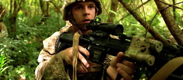 Marines assault an objective during the island seizure portion of Valiant Shield 2014 Sept. 20 near Tinian’s North Field. - Sputnik International