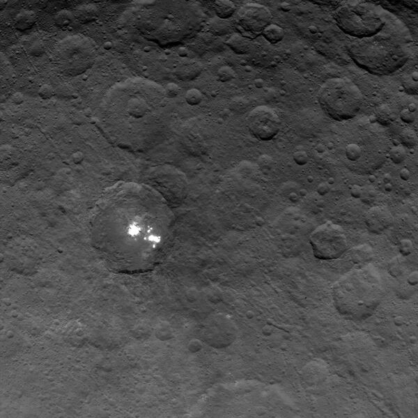 The brightest spots on dwarf planet Ceres are seen in this image taken by NASA's Dawn spacecraft on June 6, 2015. - Sputnik International