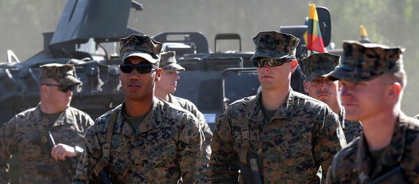 U.S. soldiers attend an opening ceremony of military exercise 'Saber Strike 2015', at the Gaiziunu Training Range in Pabrade some 60km.(38 miles) north of the capital Vilnius, Lithuania - Sputnik International
