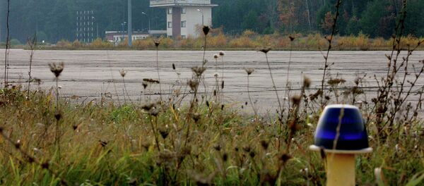 The overgrown runway of an airstrip used by the CIA to covertly bring detainees into Poland. - Sputnik International
