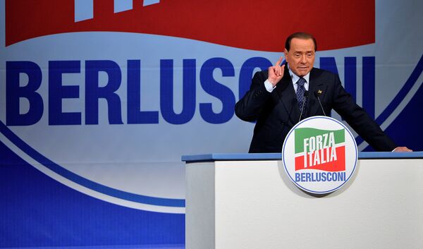 Former Italian Prime Minister and president of the Italian center-right Forza Italia (FI) party, Silvio Berlusconi gives a speech on May 22, 2014 in Rome Former Italian Prime Minister and president of the Italian center-right Forza Italia (FI) party, Silvio Berlusconi gives a speech on May 22, 2014 in Rome - Sputnik International