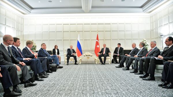 June 13, 2015. Center, from left: Russian President Vladimir Putin and President of Turkey Recep Tayyip Erdogan during a meeting at Four Seasons Hotel Baku, in Baku, Azerbaijan. - Sputnik International