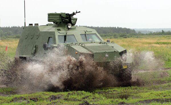 The Dozor-B, a new Ukrainian-made armored personnel carrier, undergoes testing at a training ground in Chuguyev, Kharkiv region. The Dozor-B, a new Ukrainian-made armored personnel carrier, undergoes testing at a training ground in Chuguyev, Kharkiv region. - Sputnik International