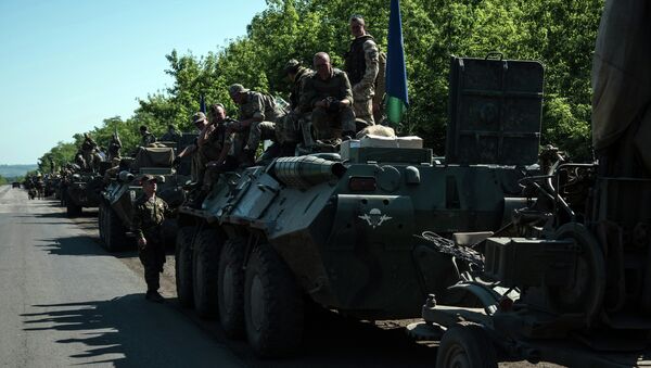 Column of Ukrainian forces stops for a rest not far from eastern Ukrainian city of Artemivsk, Donetsk region - Sputnik International