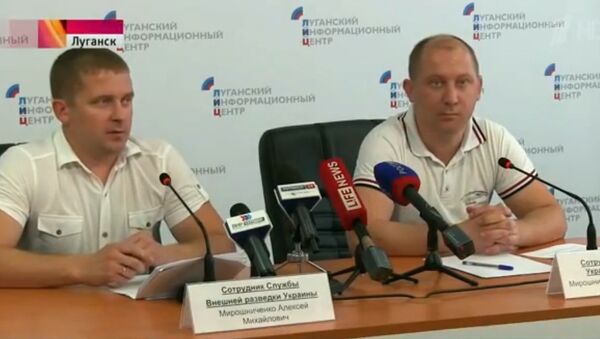 Miroshnichenko brothers at their press conference in Lugansk on Monday - Sputnik International