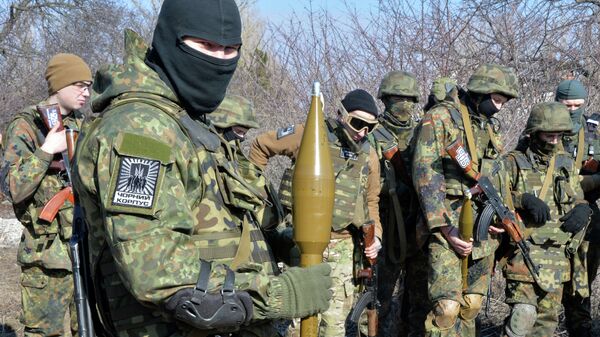 Fighters of Ukrainian volonteer Azov battalion take part in military exercises not far southeastern Ukrainian city of Mariupol, on February 27, 2015 - Sputnik International