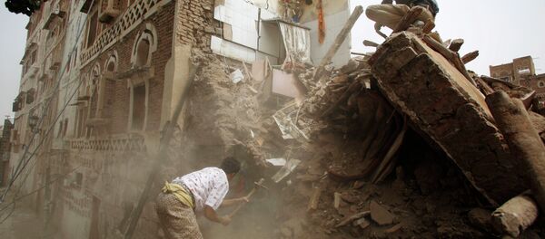 A man searches for survivors under the rubble of houses destroyed by Saudi airstrikes in the old city of Sanaa, Yemen, Friday, June 12, 2015 A man searches for survivors under the rubble of houses destroyed by Saudi airstrikes in the old city of Sanaa, Yemen, Friday, June 12, 2015 - Sputnik International