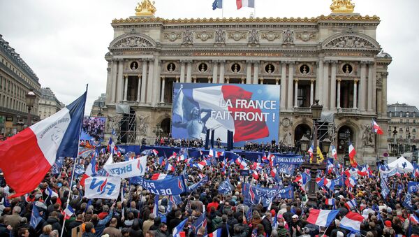 France’s far-right National Front president Marine Le Pen delivers her speech at Opera Plaza during the annual May Day march, in Paris, France, Friday, May 1, 2015 - Sputnik International