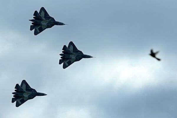 Russia's stealth fighters T-50 perform during the MAKS-2013, the International Aviation and Space Show, in Zhukovsky, outside Moscow, on August 27, 2013 - Sputnik International