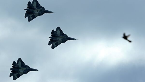 Russia's stealth fighters T-50 perform during the MAKS-2013, the International Aviation and Space Show, in Zhukovsky, outside Moscow, on August 27, 2013 - Sputnik International