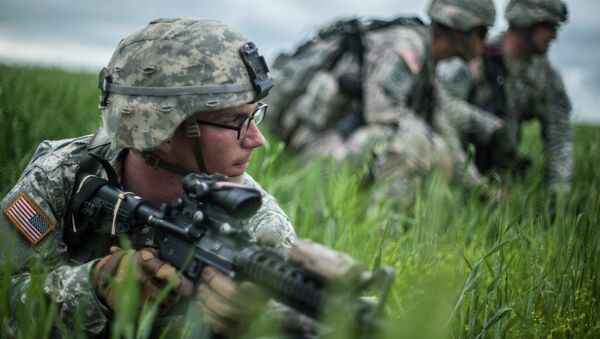 US para-trooper of the Army's 4th 25 Infantry Brigade Combat Team (Airborne), part of the NATO-led peacekeeping mission in Kosovo - Sputnik International