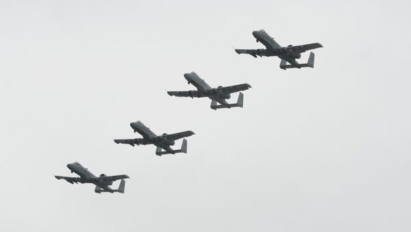 Four A-10 Warthogs from the Selfridge Air National Guard Base fly in formation. - Sputnik International