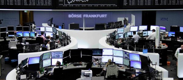Traders work at their screens in front of the German share price index DAX board at the stock exchange in Frankfurt, Germany June 16, 2015 Traders work at their screens in front of the German share price index DAX board at the stock exchange in Frankfurt, Germany June 16, 2015 - Sputnik International