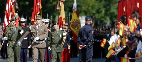 United States and NATO soldiers parade with Spanish armed forces during the National Day Parade in Madrid - Sputnik International