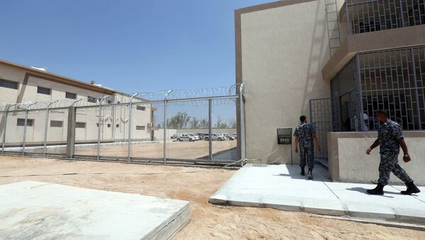 Security walk in the newly inaugurated Reform and Rehabilitation center of Al-Gauia on August 13, 2013 in Libya's coastal city of Misrata - Sputnik International