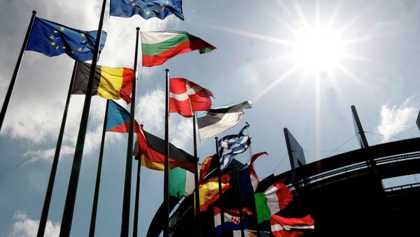 Flags are seen at the European Parliament Wednesday April 16, 2014 in Strasbourg, eastern France. The European general elections in the 27 countries of the E.U will take place from May 22 to 25, 2014 - Sputnik International