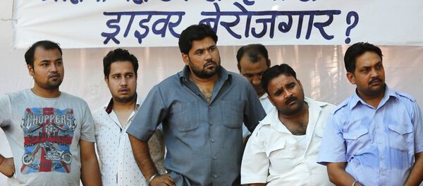 Taxi-drivers listen to a speaker during a protest in New Delhi, India, June 8, 2015 Taxi-drivers listen to a speaker during a protest in New Delhi, India, June 8, 2015 - Sputnik International
