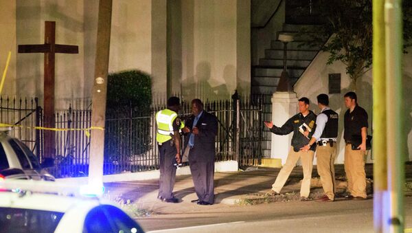 Police stand outside the Emanuel AME Church following a shooting Wednesday, June 17, 2015, in Charleston, S.C. - Sputnik International