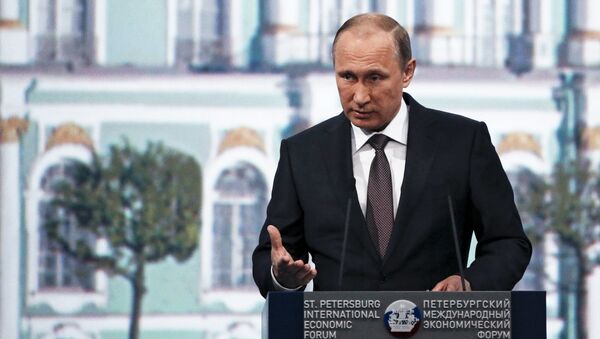 Russian President Vladimir Putin speaks during a session of the St. Petersburg International Economic Forum 2015 (SPIEF 2015) in St. Petersburg, Russia - Sputnik International