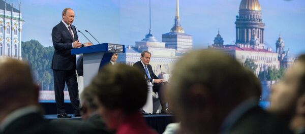 Russian President Vladimir Putin speaks during a session of the St. Petersburg International Economic Forum 2015 Russian President Vladimir Putin speaks during a session of the St. Petersburg International Economic Forum 2015 - Sputnik International