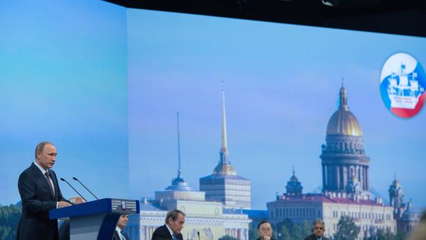 Russian President Vladimir Putin speaks during a session of the St. Petersburg International Economic Forum 2015 - Sputnik International