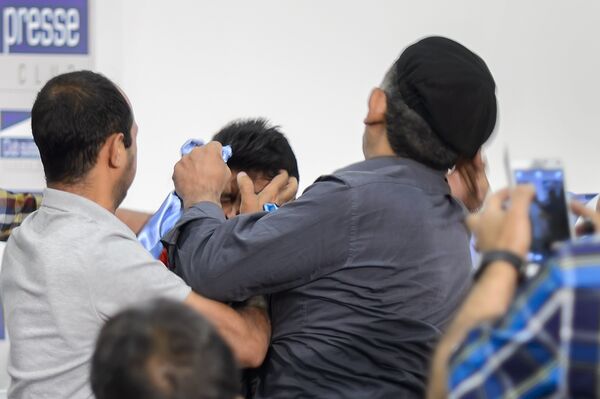 People clash at a press conference held by Yemeni rebels at the Geneva Press Club on June 18, 2015 in Geneva People clash at a press conference held by Yemeni rebels at the Geneva Press Club on June 18, 2015 in Geneva - Sputnik International