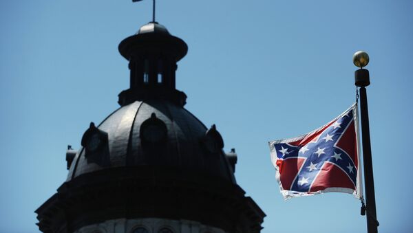 The Confederate flag flies near the South Carolina Statehouse, Friday, June 19, 2015, in Columbia, S.C. - Sputnik International