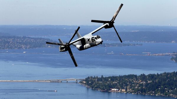 An MV-22B Osprey aircraft flies in view of Lake Washington. - Sputnik International